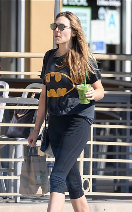 Avengers star, Elizabeth Olsen, wearing a Bat signal T-shirt Image Credit: MEGA